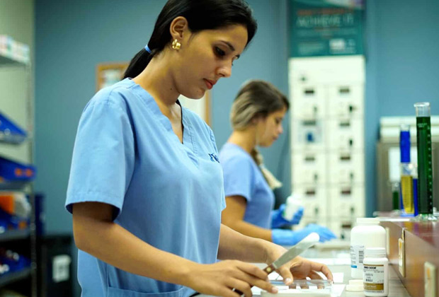 Pharmacist providing contraceptive advice